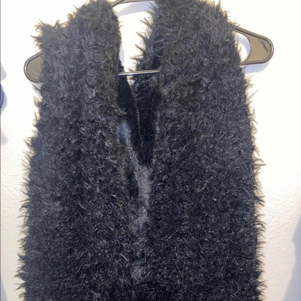 Black fur vest with hood
